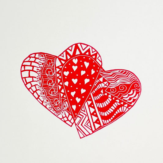 Red hearts entwined, ideal occasion gift idea. This is an original lino print, handmade and handprinted artwork